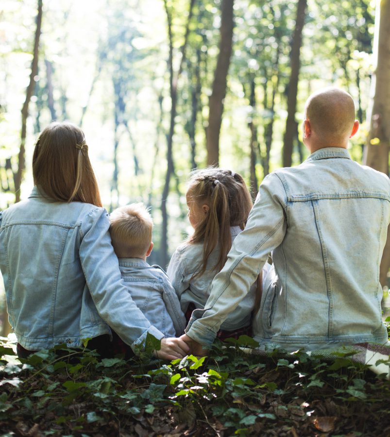 Family enjoying spare time in the woods